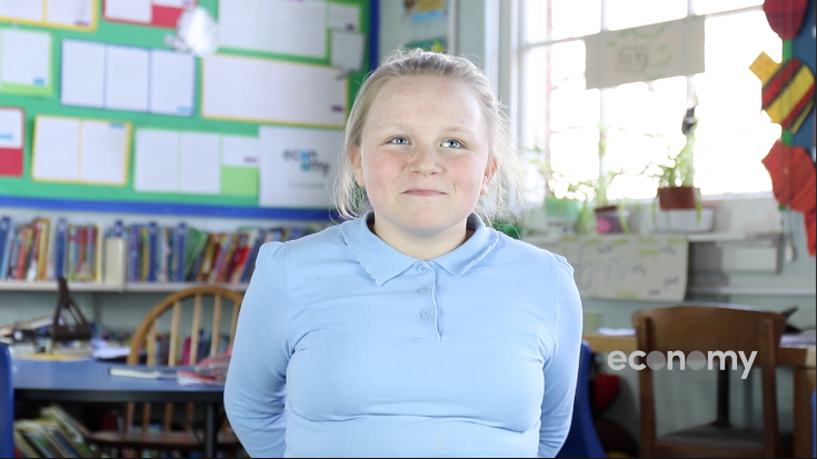 Schoolgirl sat in classroom