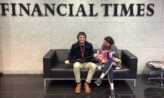 Two members of the Economy team wait in the reception area of the Financial Times