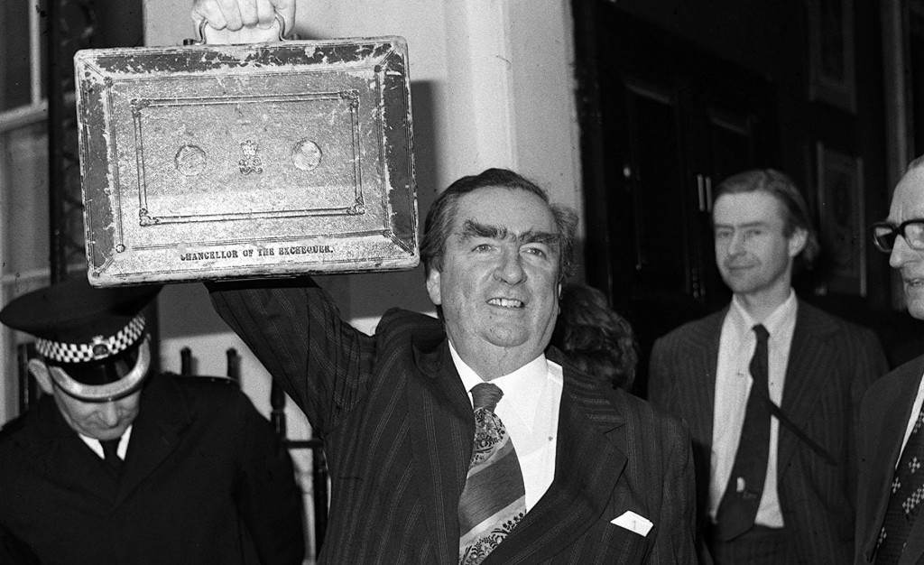 Former Chancellor Denis Healey holds up his despatch box as he leaves 11 Downing Street to present his budget in the House of Commons in 1977.