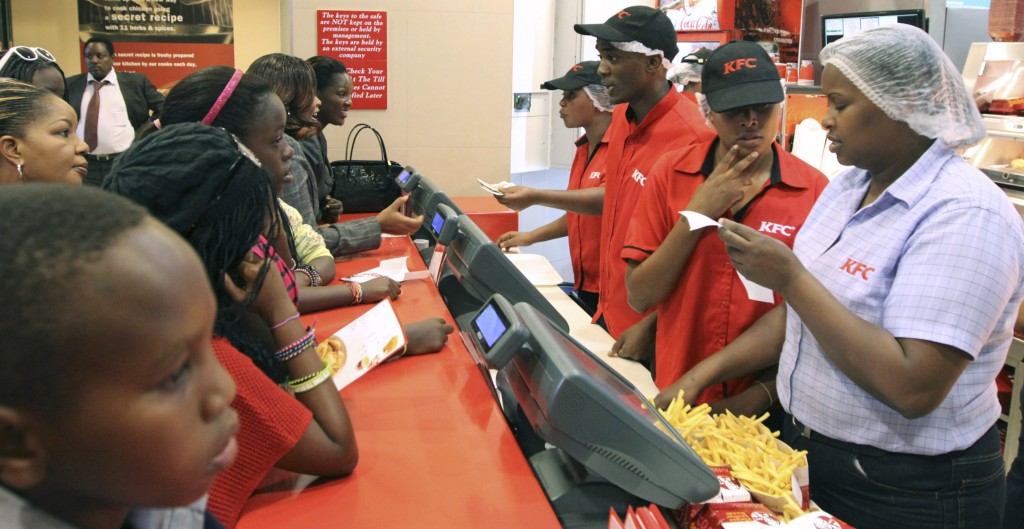 Customers waiting to place their orders at Kentucky fried chicken restaurant in Nairobi, Kenya