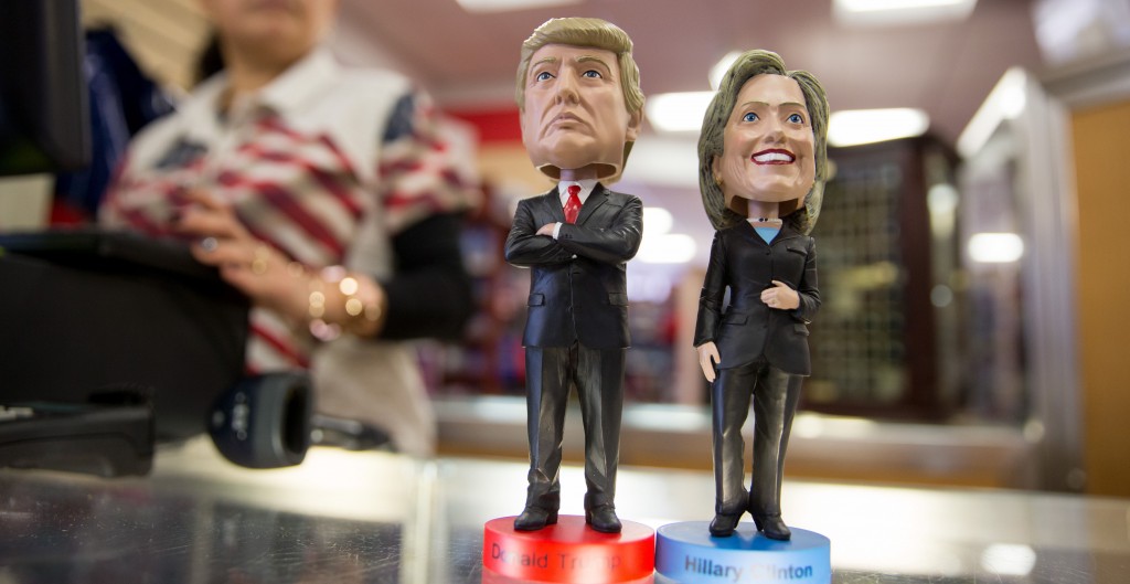 Wobbling figures with the heads of Republican candidate Donald Trump and Democrat candidate Hillary Clinton