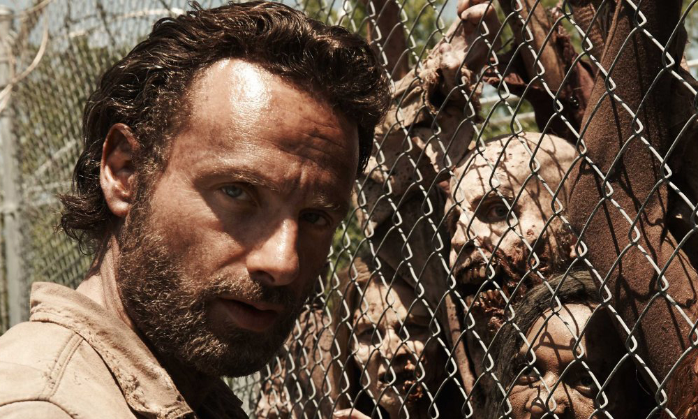 Andrew Lincoln with zombies from The Walking Dead