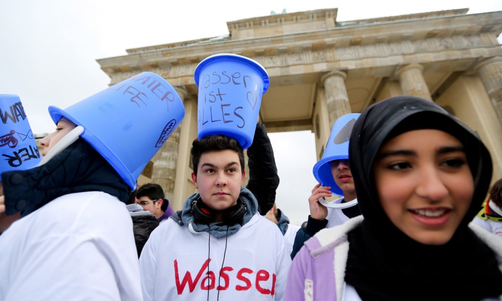 Students demonstrate against polluted water on World Water Day 2013 in front of the Brandenburger Tor in Berlin