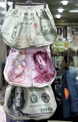 Men's underwear with banknote prints of South Korea won, Chinese yuan and U.S. dollar are displayed at a shop in Seoul
