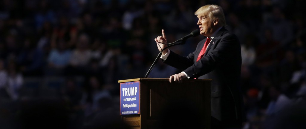 Donald Trump stands at a podium during a recent speech in the US