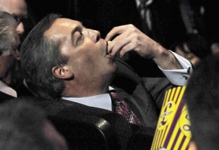 Nigel Farage eating popcorn