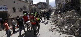 Rescuers on the site of the earthquake in central Italy