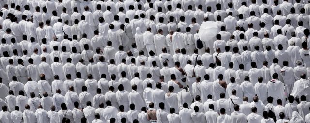 Hundreds of thousands of Muslim pilgrims pray outside Namira Mosque in Arafat