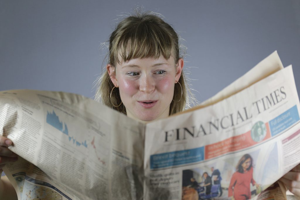 Girl reads Financial Times