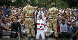 Ethiopian soldiers try to stop protesters in Ethiopia