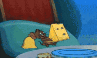 Jerry the mouse eating a block of cheese