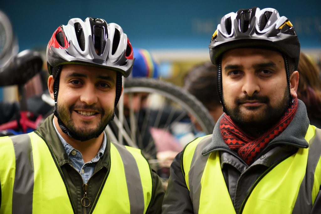 Two men wearing bike gear