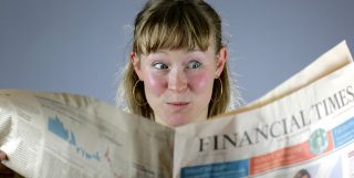 Girl reading Financial Times