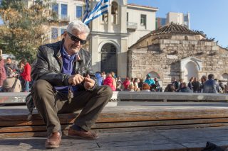 Man crouching on ground