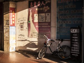 A bike in a Chinese part of Prato, Italy.