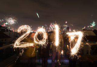 People using sparklers to spell out 2017