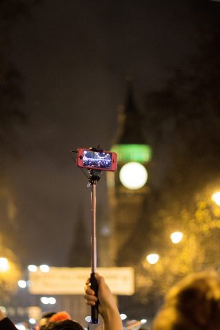 Selfie stick with Big Ben in background