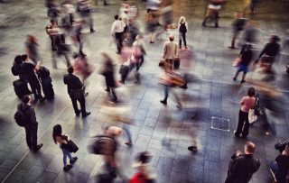 passengers-travellers-business-people-and-commuters-rushing-around-and-waiting-for-trains-in-a-train_t20_XQb9vR