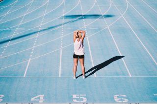 blue-running-stretching-sports-run-woman-athlete-athletics-fitness-running-track_t20_px8Z4P