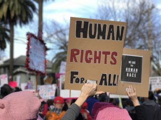 nominated-sign-at-rally-advocating-for-human-rights_t20_pY0z4N