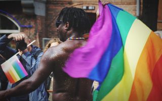 pride-parade-2019-denmark-europe-man-street-photography-rainbow-colors-shirtless-dancing-positive_t20_nR4EkR