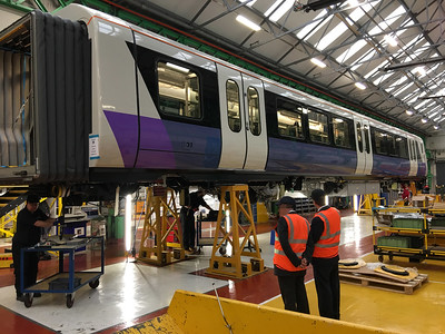 Workers building a TfL Rail train