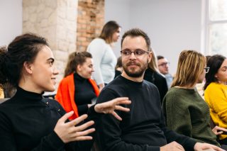 Young people talking with each other.