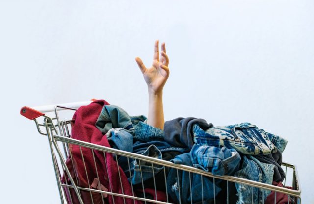 Picture of a shopping cart full of clothes