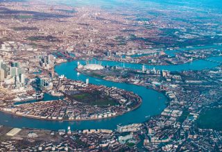 Aerial view of Dockland, O2 Arena, River Thames and East London, UK