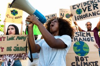 Group of activists protesting for climate change during covid19